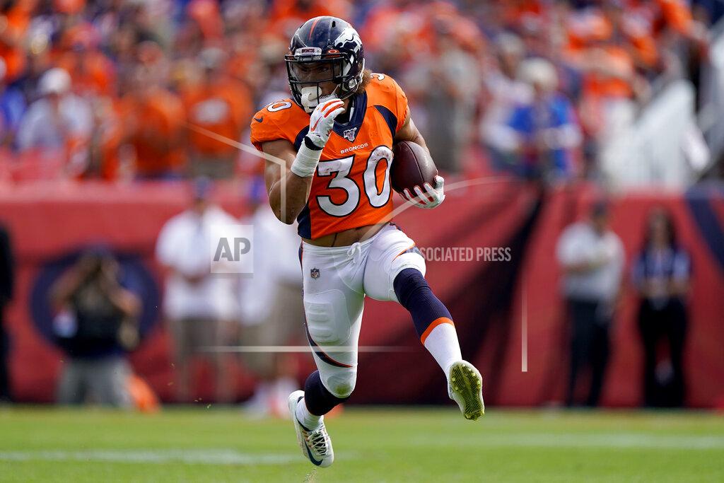 Jack Dempsey Denver Broncos running back Phillip Lindsay (30) runs the ball against the Chicago Bears during the first half of an NFL football game, Sunday, Sept. 15, 2019, in Denver. (AP Photo/Jack Dempsey)
