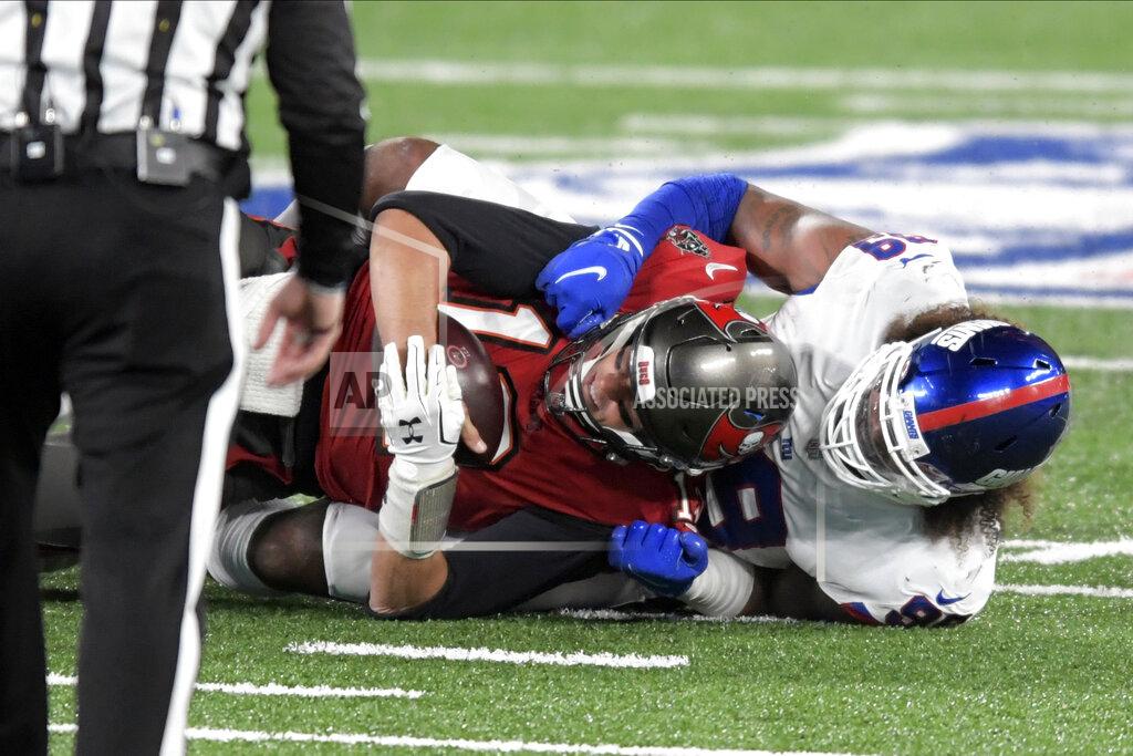 Bill Kostroun New York Giants' Leonard Williams, right, sacks Tampa Bay Buccaneers quarterback Tom Brady during the first half of an NFL football game, Monday, Nov. 2, 2020, in East Rutherford, N.J. (AP Photo/Bill Kostroun)