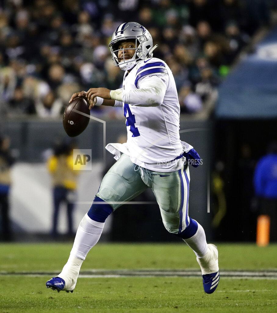 Matt Rourke FILE - In this Nov. 11, 2018, file photo, Dallas Cowboys quarterback Dak Prescott (4) in action during an NFL football game against the Philadelphia Eagles, in Philadelphia. The Los Angeles Rams and Cowboys meet in a divisional playoff game on Saturday, Jan. 12, 2019.(AP Photo/Matt Rourke, File)