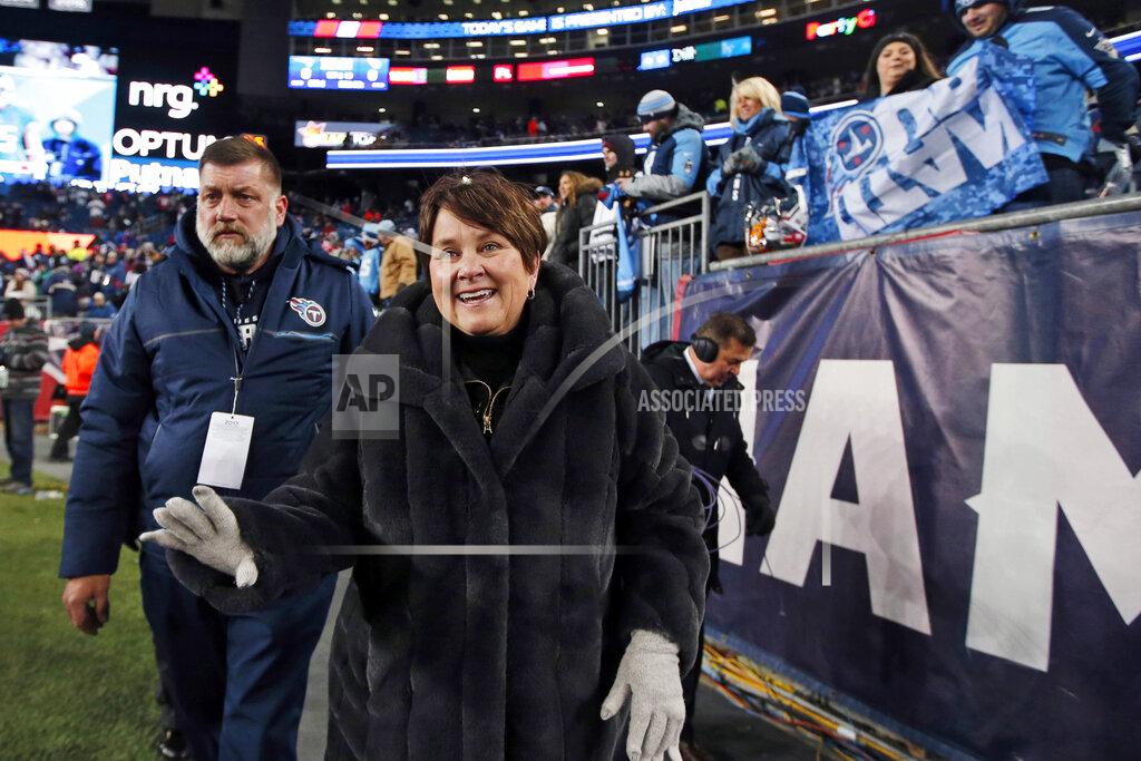 Michael Dwyer FILE - In this Jan. 13, 2018, file photo, Tennessee Titans controlling owner Amy Adams Strunk greets fans before an NFL divisional playoff football game between the New England Patriots and the Titans in Foxborough, Mass. Ownership of the Titans is remaining with the Adams family with Susie Adams Smith agreeing to sell her share of the team to KSA Industries Inc. Amy Adams Strunk will hold a 50% share with the other 50% held by Kenneth Adams IV, Barclay Adams and Susan Lewis who will continue as owners of the Titans with Adams Strunk continuing as controlling owner in a sale expected to be completed by the end of this year. (AP Photo/Michael Dwyer, File)