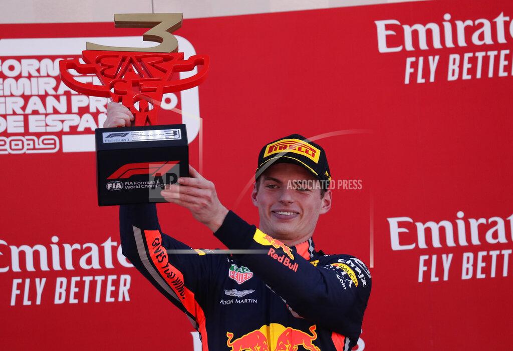Manu Fernandez Red Bull driver Max Verstappen of the Netherland's, third place, celebrates on the podium after the Spanish Formula One race at the Barcelona Catalunya racetrack in Montmelo, just outside Barcelona, Spain, Sunday, May 12, 2019. (AP Photo/Manu Fernandez)