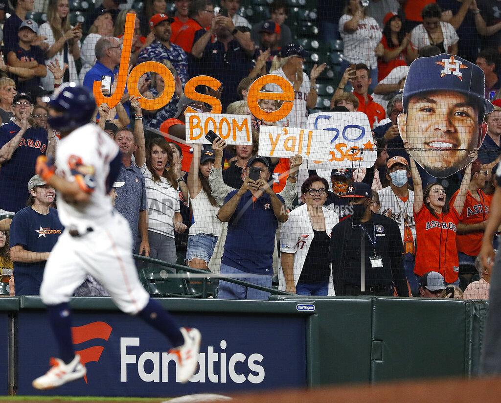 Kevin M. Cox Fans cheer as Houston Astros Jose Altuve rounds the bases after hitting a solo home run off Cleveland Indians starting pitcher Triston McKenzie during the third inning of a baseball game Tuesday, July 20, 2021, in Houston. (Kevin M. Cox/The Galveston County Daily News via AP)