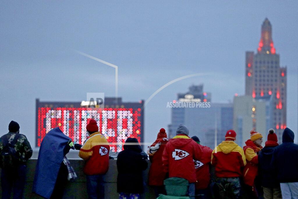 Charlie Riedel People gather at the Liberty Memorial as they wait for a parade through downtown Kansas City, Mo. to celebrate the Kansas City Chiefs victory in NFL's Super Bowl 54 Wednesday, Feb. 5, 2020. (AP Photo/Charlie Riedel)