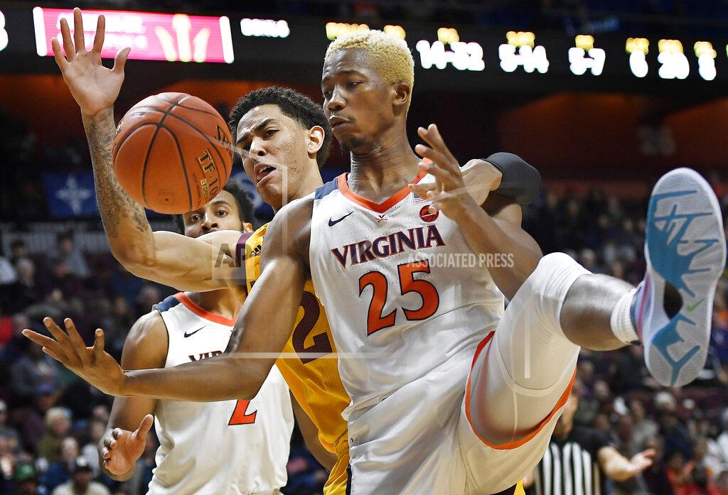 Jessica Hill Arizona State's Jalen Graham, center left, and Virginia's Mamadi Diakite (25) fight for a rebound during the second half of an NCAA college basketball game, Sunday, Nov. 24, 2019, in Uncasville, Conn. (AP Photo/Jessica Hill)