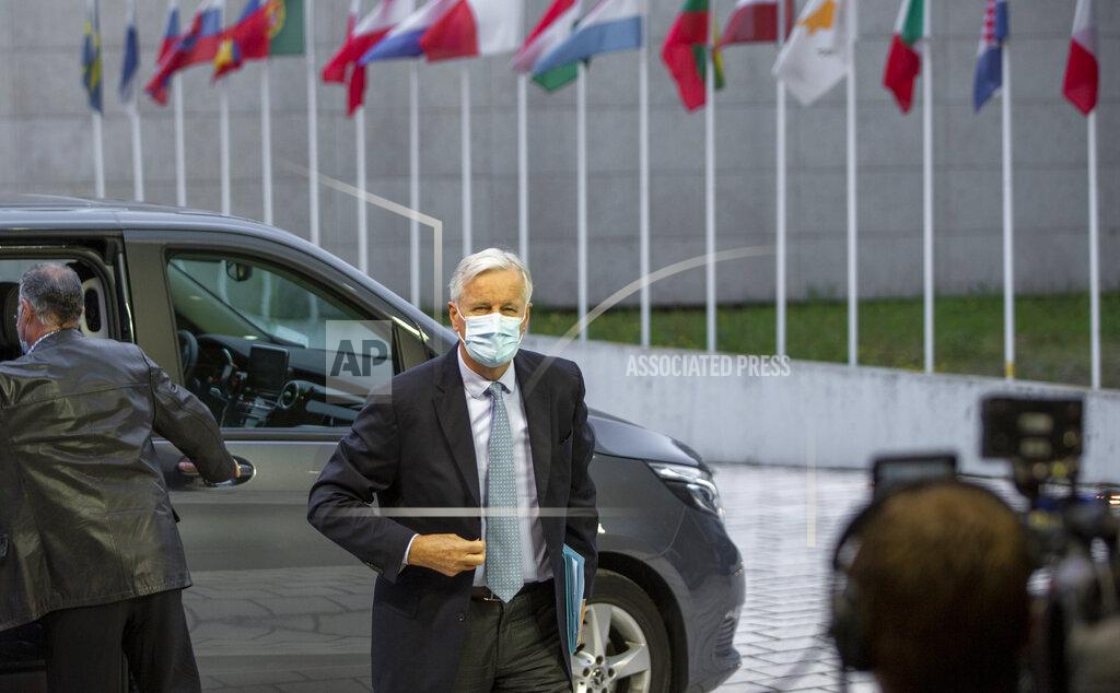 European Commission's Head of Task Force for Relations with the United Kingdom Michel Barnier arrives for a meeting of EU General Affairs ministers at the European Council building in Luxembourg, Tuesday, Oct. 13, 2020. European Commission's Head of Task Force for Relations with the United Kingdom Michel Barnier will brief ministers on the state of play in EU-UK Brexit negotiations ahead of a key EU summit on Thursday. (AP Photo/Virginia Mayo, Pool)