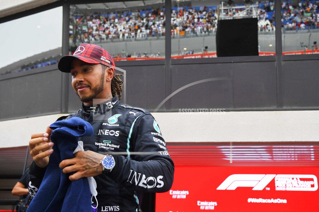 Nicolas Tucat Mercedes driver Lewis Hamilton of Britain reacts after the qualifying session ahead of the French Formula One Grand Prix at the Paul Ricard racetrack in Le Castellet, southern France, Saturday, June 19, 2021. The French Grand Prix will be held on Sunday. (Nicolas Tucat/Pool via AP)