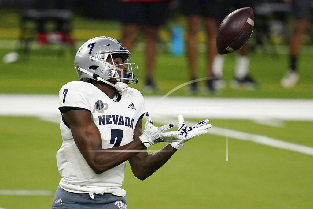 John Locher Nevada wide receiver Romeo Doubs catches a pass during the first half of an NCAA college football game against UNLV on Saturday, Oct. 31, 2020, in Las Vegas. (AP Photo/John Locher)