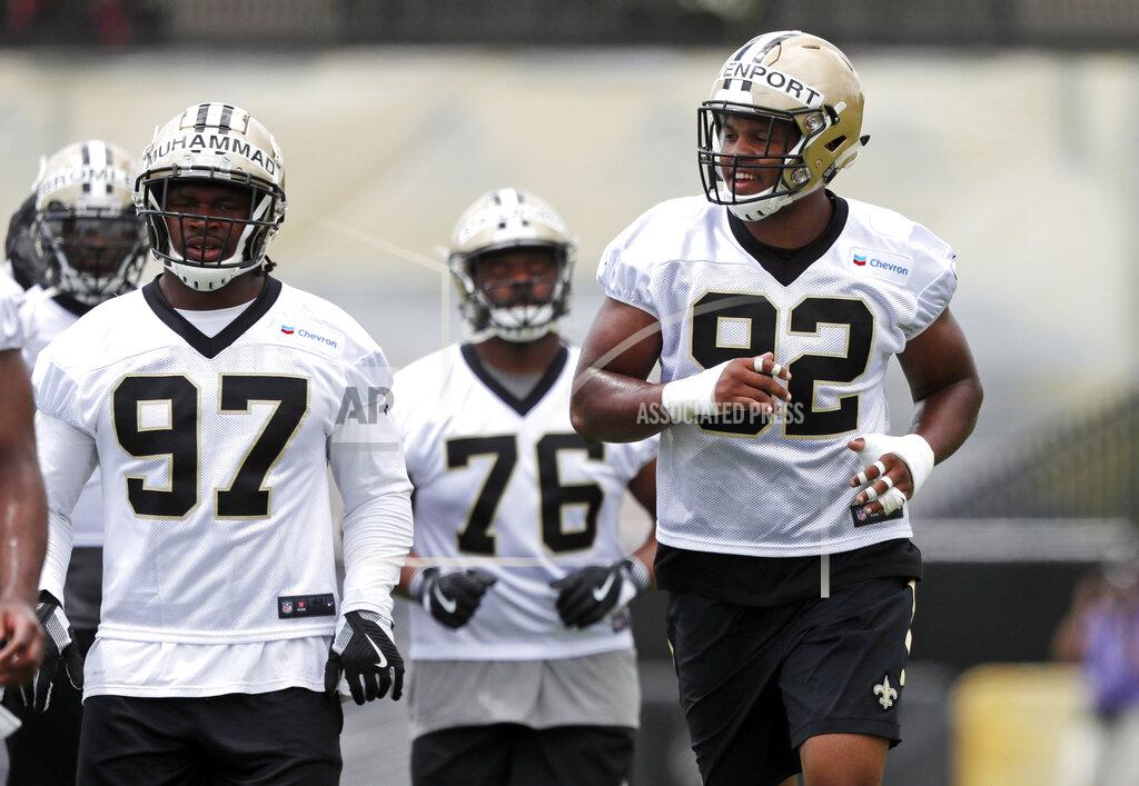 FILE - In this Tuesday, June 12, 2018, file photo, New Orleans Saints defensive end Marcus Davenport (92) warms during NFL football practice in Metairie, La. Saints defensive end Marcus Davenport says focusing on the truth regarding what kind of player he is and still can be gives him confidence heading into his second NFL season. (AP Photo/Gerald Herbert, File)