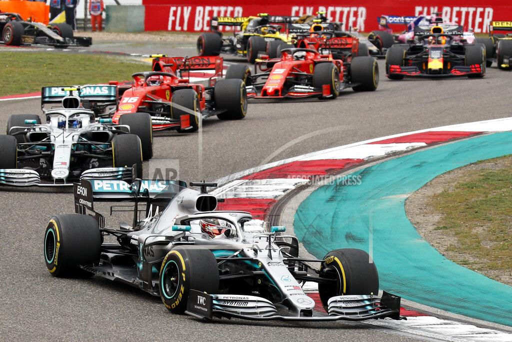 Andy Wong Mercedes driver Lewis Hamilton of Britain leads the field at the start of the Chinese Formula One Grand Prix at the Shanghai International Circuit in Shanghai, Sunday, April 14, 2019. (AP Photo/Andy Wong)