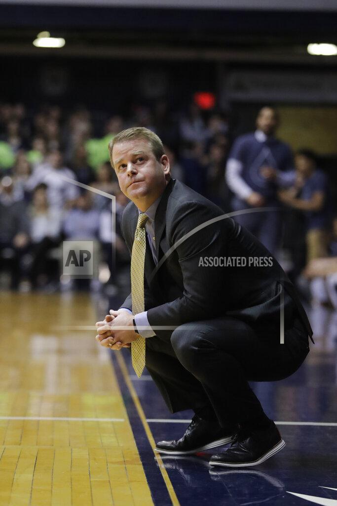 Darron Cummings Marquette head coach Steve Wojciechowski looks up at a replay during the first half of an NCAA college basketball game against Butler, Wednesday, Jan. 30, 2019, in Indianapolis. (AP Photo/Darron Cummings)