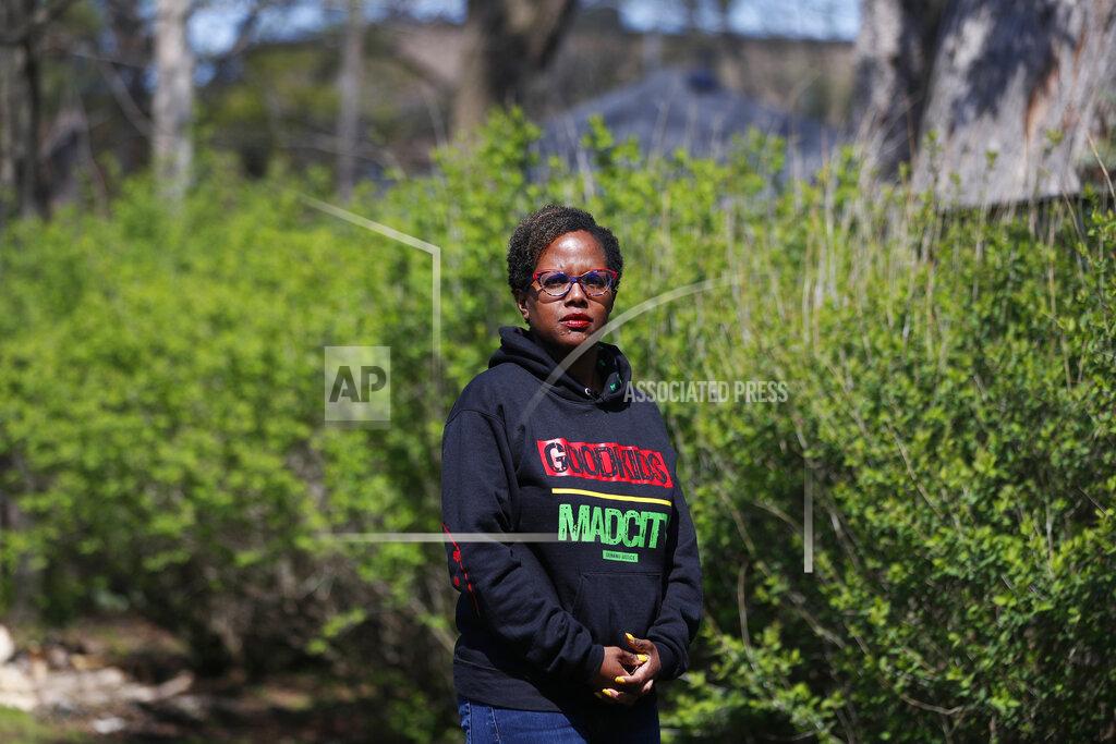 Shafkat Anowar Cicely Fleming, alderwoman of Evanston's 9th Ward, poses for a portrait at her home in Evanston, Ill., Thursday, April 15, 2021. Acknowledging past racist policies, Evanston is giving eligible Black residents $25,000-housing grants for down payments, repairs or existing mortgages this year. Fleming, who voted against the grants, said she supports reparations but Evanston's effort isn’t that. Instead of giving money to banks, direct cash payments would give Black people power in deciding how they need repair, she said. (AP Photo/Shafkat Anowar)