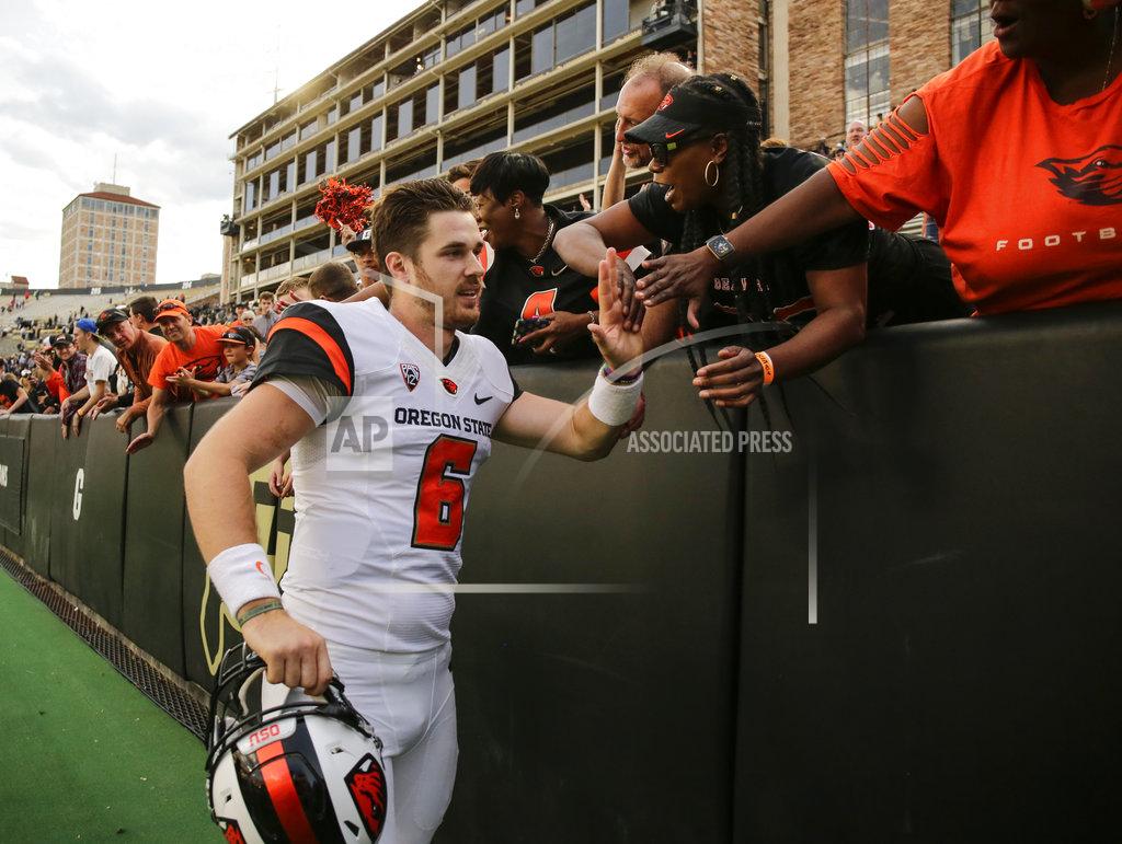 Jack Dempsey Oregon State quarterback Jake Luton high fives fans after the team's overtime win against Colorado in an NCAA football game, Saturday, Oct. 27, 2018, in Boulder, Colo. (AP Photo/Jack Dempsey)