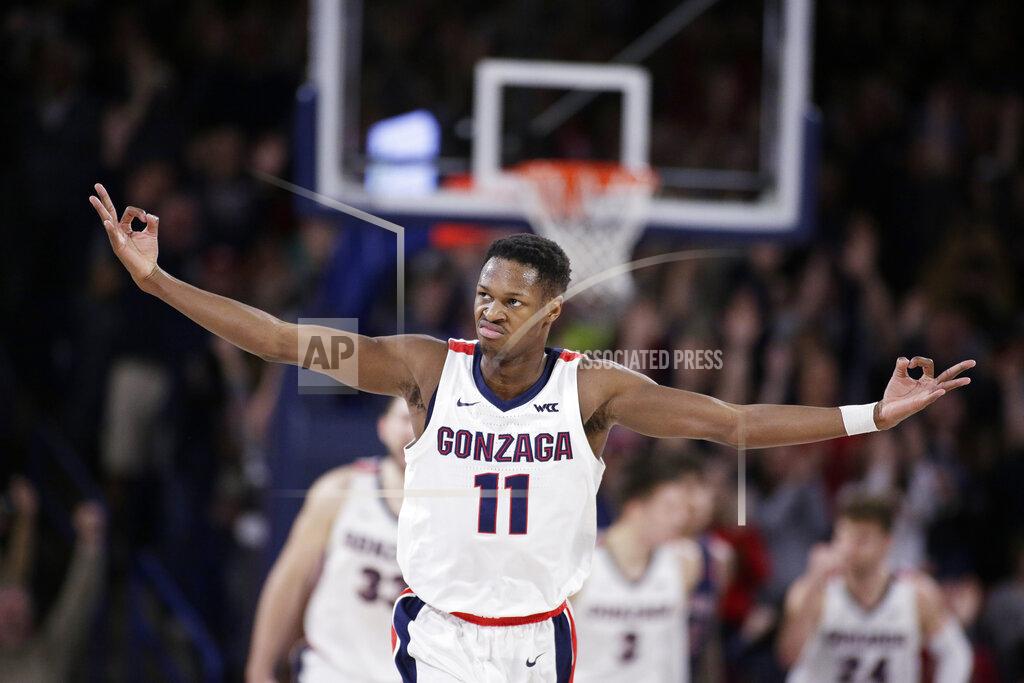 Young Kwak Gonzaga guard Joel Ayayi (11) gestures after scoring a basket during the second half of the team's NCAA college basketball game against Saint Mary's in Spokane, Wash., Saturday, Feb. 29, 2020. Gonzaga won 86-76. (AP Photo/Young Kwak)