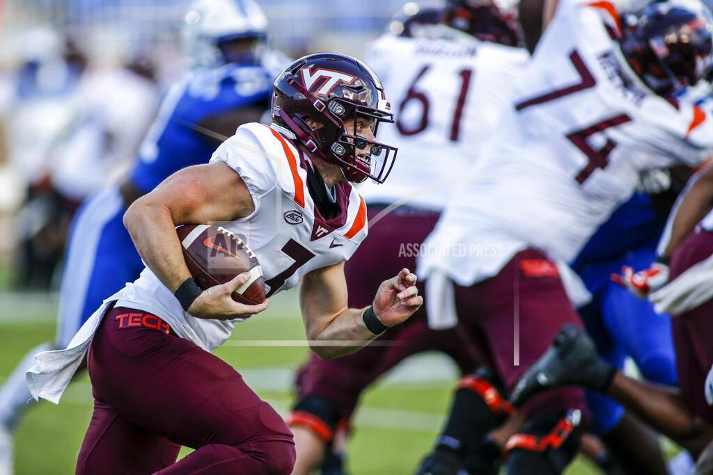 Nell Redmond Virginia Tech quarterback Braxton Burmeister (3) carries the ball against Duke during the first half of an NCAA college football game, Saturday, Oct. 3, 2020, in Durham, N.C. (Nell Redmond/Pool Photo via AP)