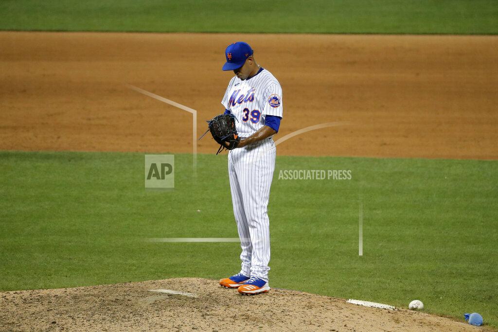 Seth Wenig New York Mets relief pitcher Edwin Diaz stands on the mound after hitting Boston Red Sox's Jose Peraza with a pitch which resulted in a run during the ninth inning of the baseball game at Citi Field, Thursday, July 30, 2020, in New York. (AP Photo/Seth Wenig)