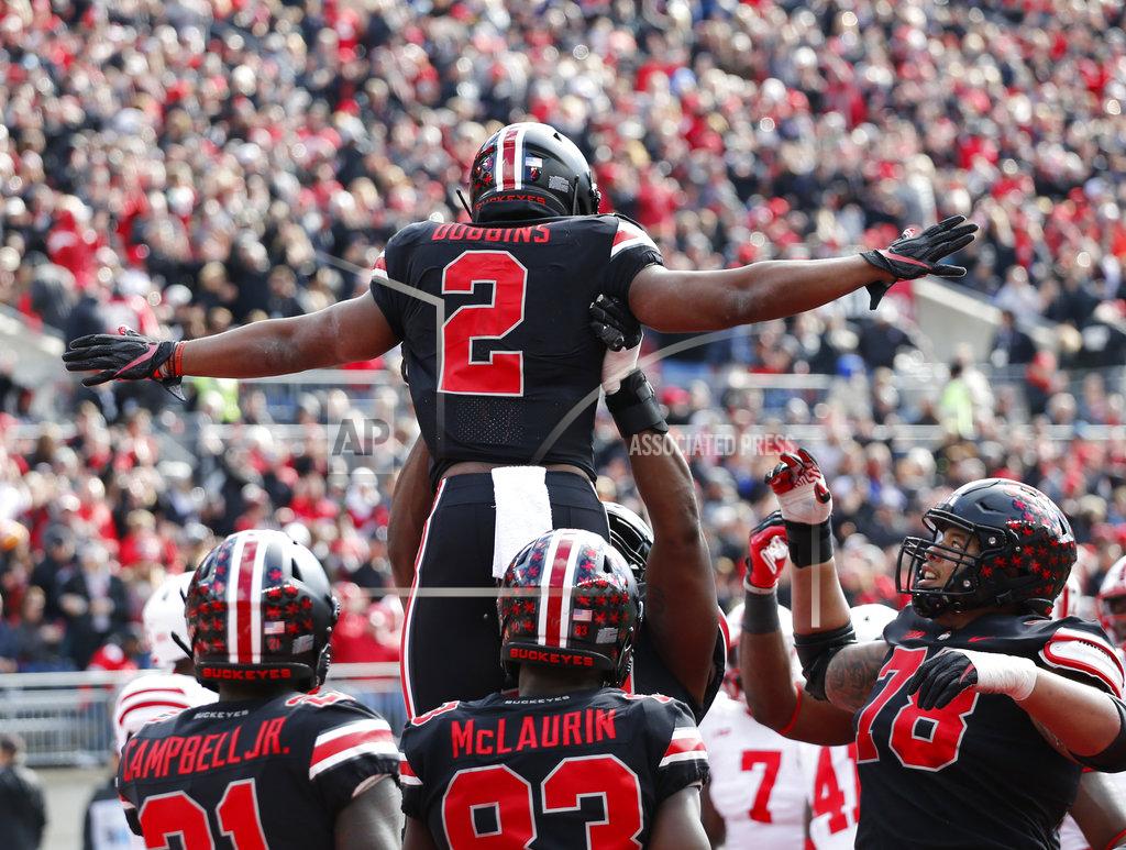 Jay Laprete Ohio State running back J.K. Dobbins celebrates with teammates after scoring a touchdown against Nebraska during the first half of an NCAA college football game Saturday, Nov. 3, 2018, in Columbus, Ohio. (AP Photo/Jay LaPrete)