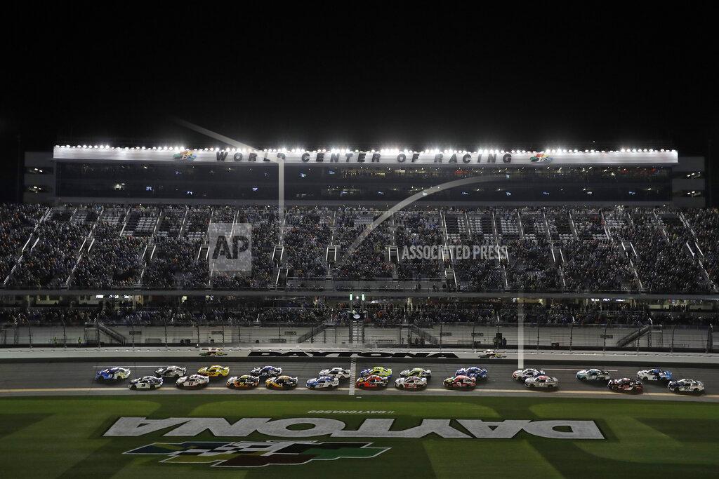 Chris O'meara Drivers take the green flag to start the first of two NASCAR Daytona 500 qualifying auto races Thursday, Feb. 13, 2020, at Daytona International Speedway in Daytona Beach, Fla. (AP Photo/Chris O'Meara)