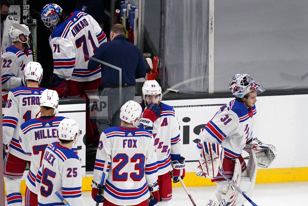 Charles Krupa New York Rangers goaltender Keith Kinkaid (71) heads to the locker room after an apparent injury as goaltender Igor Shesterkin (31) skates to the crease during the third period of an NHL hockey game against the Boston Bruins, Saturday, May 8, 2021, in Boston. (AP Photo/Charles Krupa)