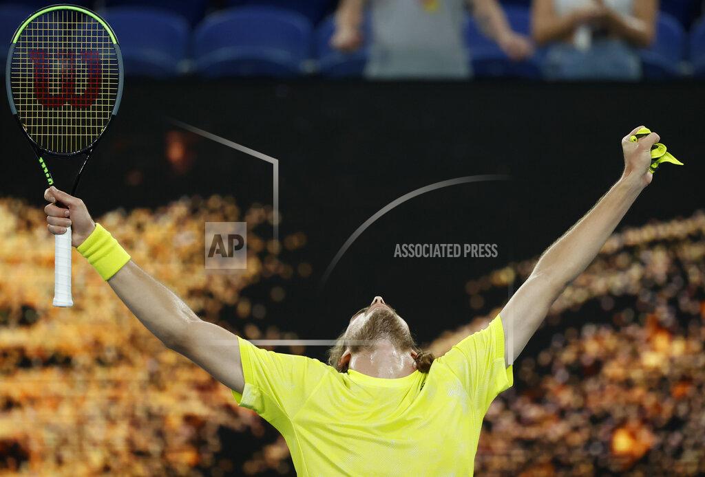 Greece's Stefanos Tsitsipas celebrates after defeating Australia's Thanais Kokkinakis in their second round match at the Australian Open tennis championship in Melbourne, Australia, Thursday, Feb. 11, 2021.(AP Photo/Rick Rycroft)