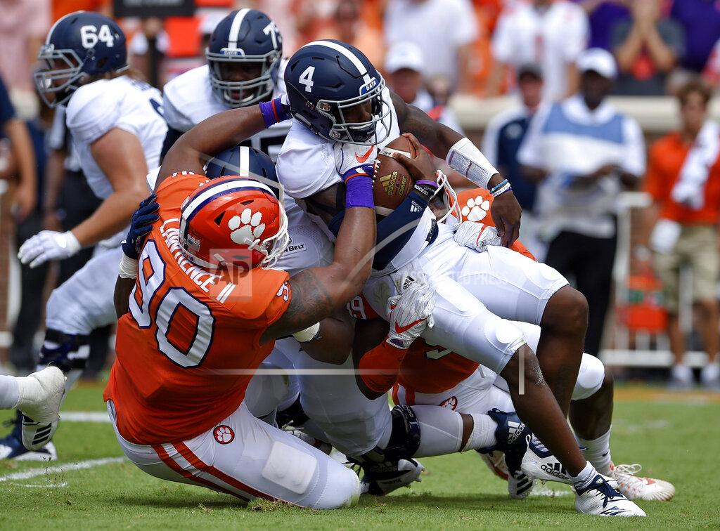 Richard Shiro FILE - In this Sept. 15, 2018, file photo, Clemson's Dexter Lawrence brings down Georgia Southern quarterback Shai Werts during the first half of an NCAA college football game, in Clemson, S.C. Lawrence is a possible pick in the 2019 NFL Draft. (AP Photo/Richard Shiro, File)