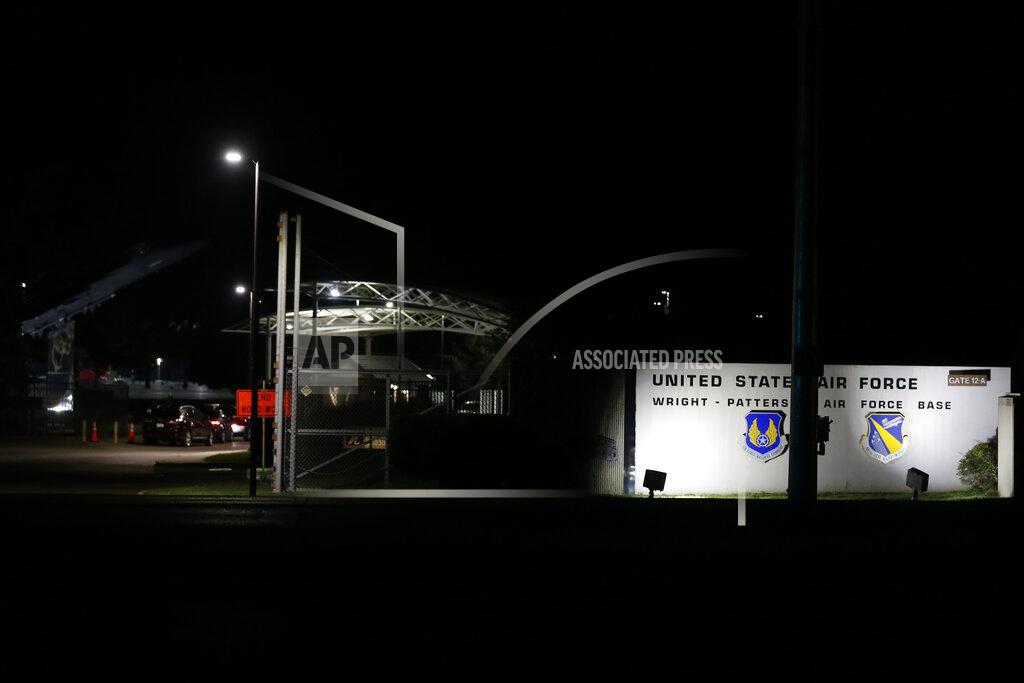 Jay Laprete People wait in their cars outside the main gate of Wright-Patterson Air Force Base during a lockdown Friday, Sept. 10, 2021, in Dayton, Ohio. The base was put on lockdown due to a report of an active shooter but was later given the all clear. (AP Photo/Jay LaPrete)