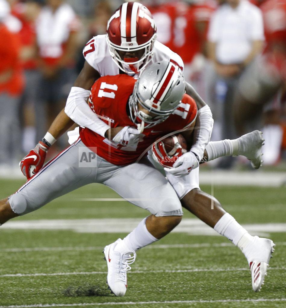 Jay Laprete Ohio State receiver Austin Mack, front, is tackled by Indiana defensive back Raheem Layne during the second half of an NCAA college football game Saturday, Oct. 6, 2018, in Columbus, Ohio. (AP Photo/Jay LaPrete)