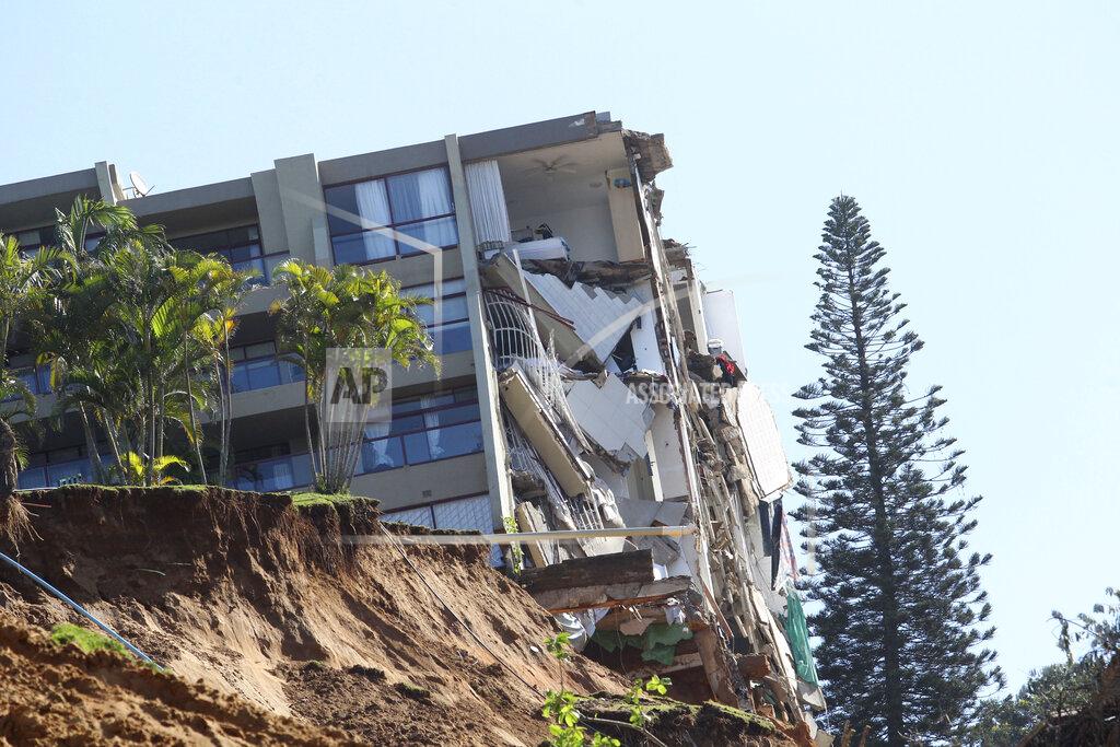 Uncredited A damaged apartment building stands on a precipice near Durban, South Africa, Monday, May 23, 2022. More than 300 people have been evacuated from their homes as a result of renewed heavy rains, flooding and mudslides in South Africa's KwaZulu-Natal province, weeks after severe flooding killed more than 400 people and displaced more than 40,000 others. (AP Photo)
