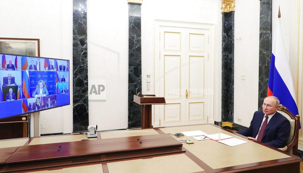 Mikhail Klimentyev Russian President Vladimir Putin chairs a Security Council meeting via video conference in Moscow, Russia, Friday, Feb. 5, 2021. (Mikhail Klimentyev, Sputnik, Kremlin Pool Photo via AP)