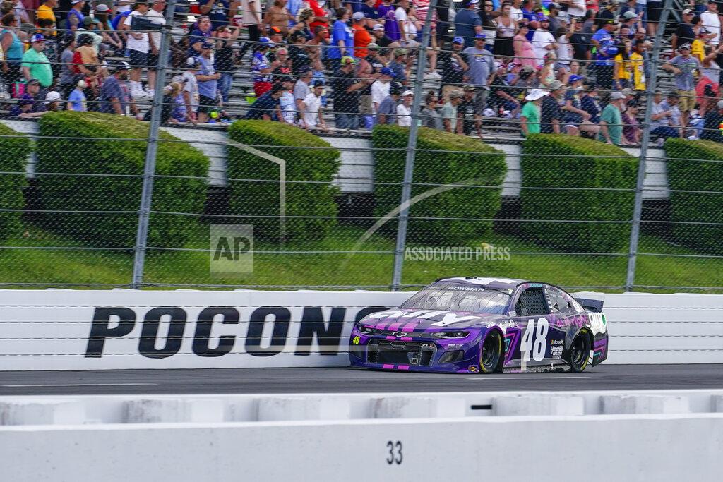 Matt Slocum Alex Bowman (48) motors down the front straight near the end of a NASCAR Cup Series auto race at Pocono Raceway, Saturday, June 26, 2021, in Long Pond, Pa. Bowman passed Kyle Larson on the last lap to win. (AP Photo/Matt Slocum)