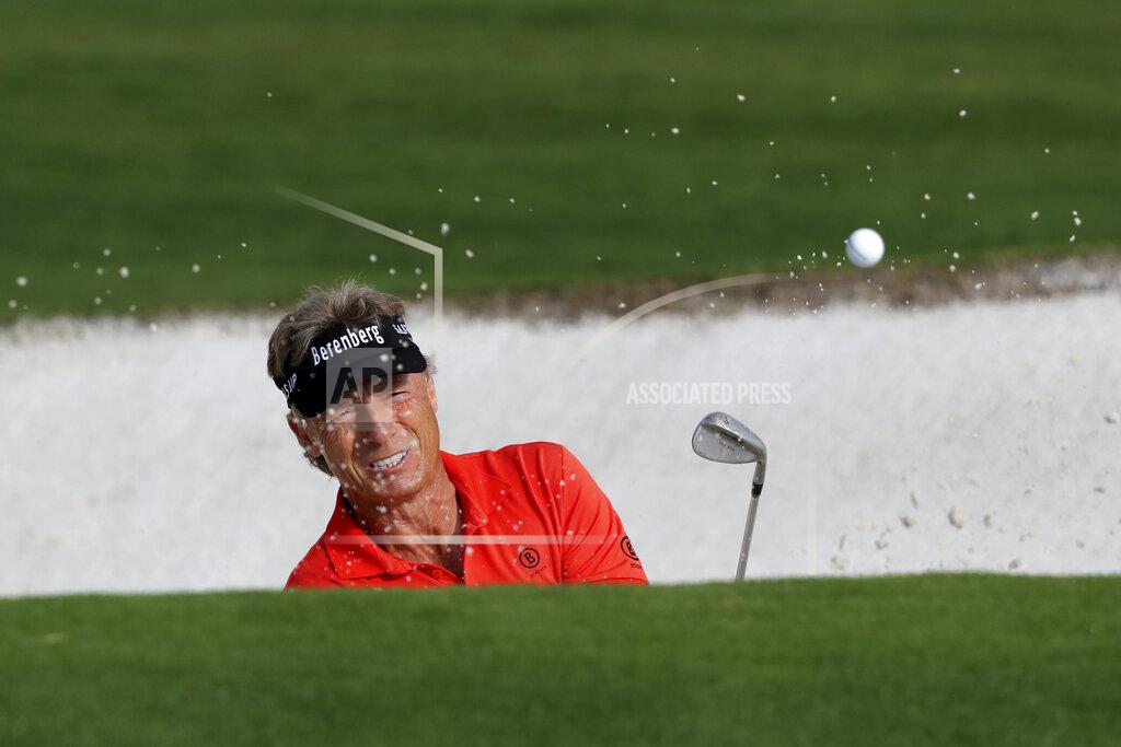 Curtis Compton Bernhard Langer hits out of a bunker on the 9th hole to finish his first round of the Masters Friday, Nov. 13, 2020, in Augusta, Ga. (Curtis Compton/Atlanta Journal-Constitution via AP)