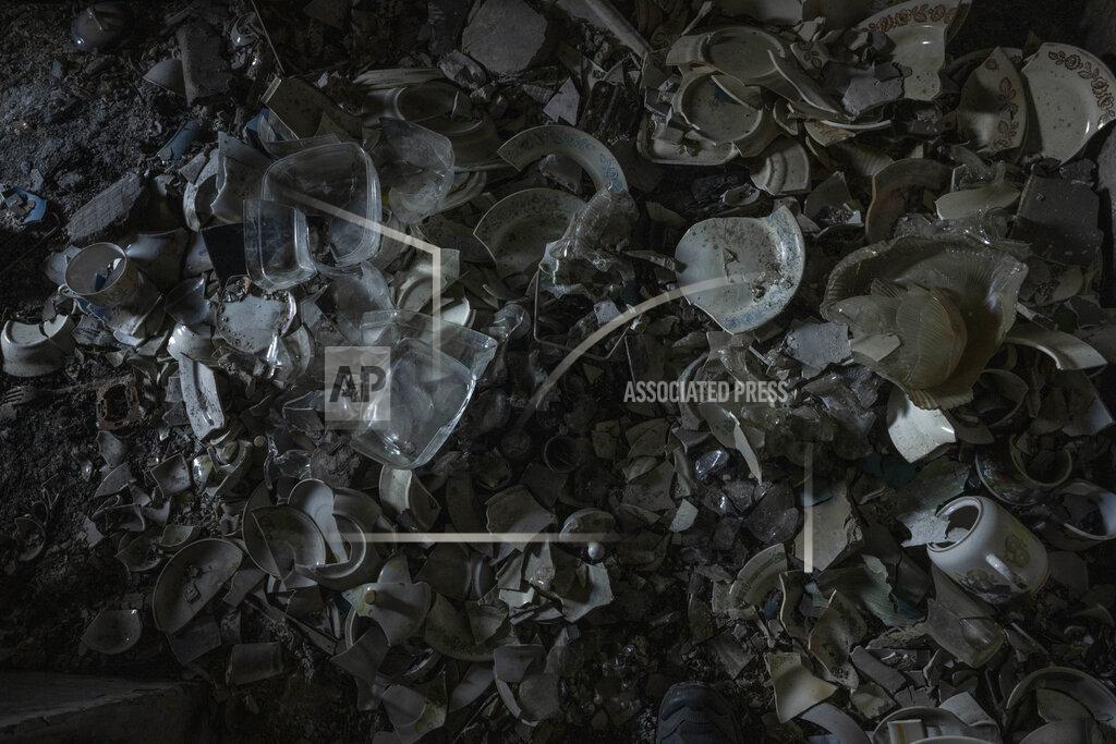 Nariman El-Mofty Damage in the home of 64-year-old Tetiana Solohub, destroyed from Russian aerial bombs, in Borodyanka, Kyiv region, Ukraine, Tuesday, June 28, 2022. "And now, at 64, I am forced to be homeless," Solohub said. She doesn't have a damaged apartment to live in. Hers is completely gone. Solohub now lives in a camp made of shipping containers. (AP Photo/Nariman El-Mofty)