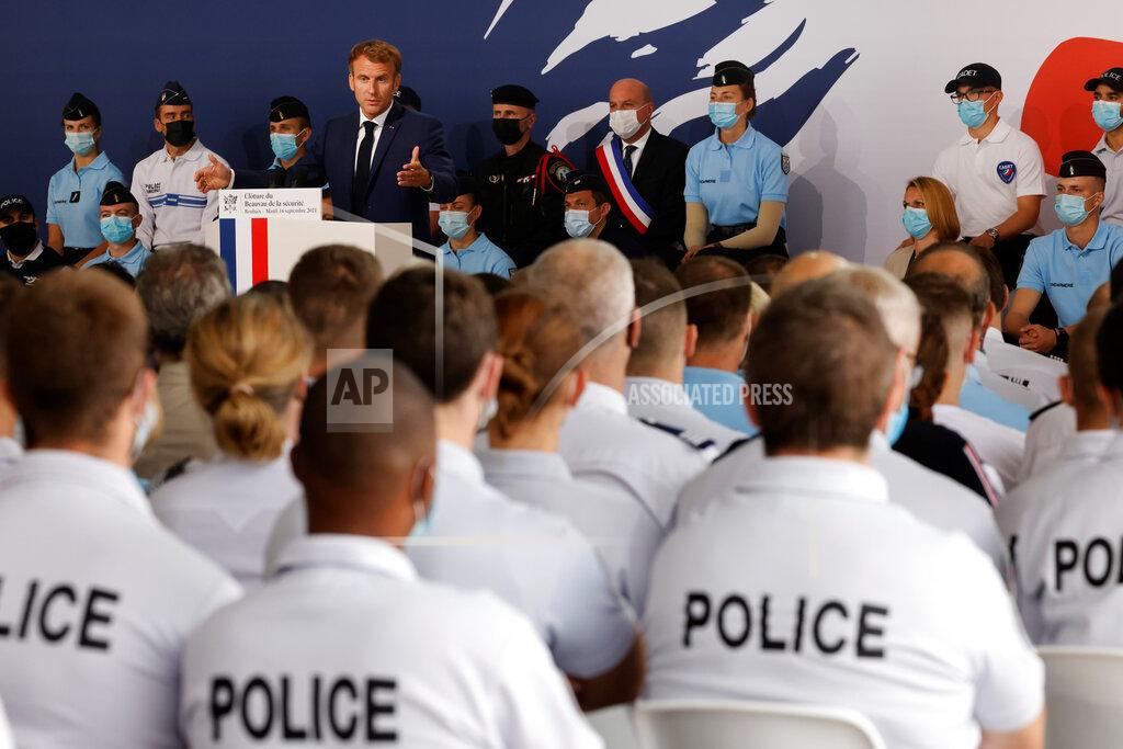 Ludovic Marin French President Emmanuel Macron speaks during his visit at the police academy of Roubaix, northern France, Tuesday, Sept. 14, 2021. (Ludovic Marin, Pool via AP)