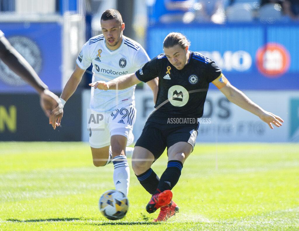 Graham Hughes CF Montreal's Samuel Piette, right, challenges Chicago Fire's Stanislav Ivanov during first-half MLS soccer match action in Montreal, Sunday, Sept. 19, 2021. (Graham Hughes/The Canadian Press via AP)