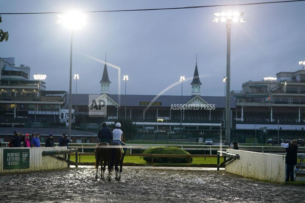 Darron Cummings Exercise rider Heather Smullen takes Kentucky Derby entry Tiz the Law out for a workout at Churchill Downs, Wednesday, Sept. 2, 2020, in Louisville, Ky. (AP Photo/Darron Cummings)