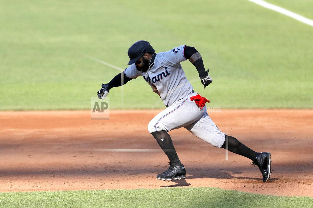 Julio Cortez Miami Marlins' Jonathan Villar runs to second base on a ground out by Jon Berti during the third inning in game one of a baseball double-header against the Baltimore Orioles, Wednesday, Aug. 5, 2020, in Baltimore. (AP Photo/Julio Cortez)