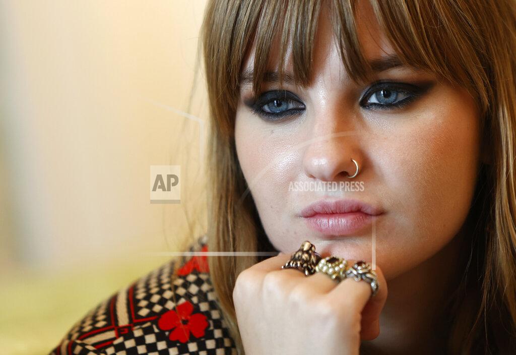 Riccardo De Luca Victoria De Angelis, bass player of Italian band Maneskin, winners of the Eurovision Song Contest in May, listens during an interview with the Associated Press at a hotel in Rome, Tuesday, July 27, 2021. (AP Photo/Riccardo De Luca)