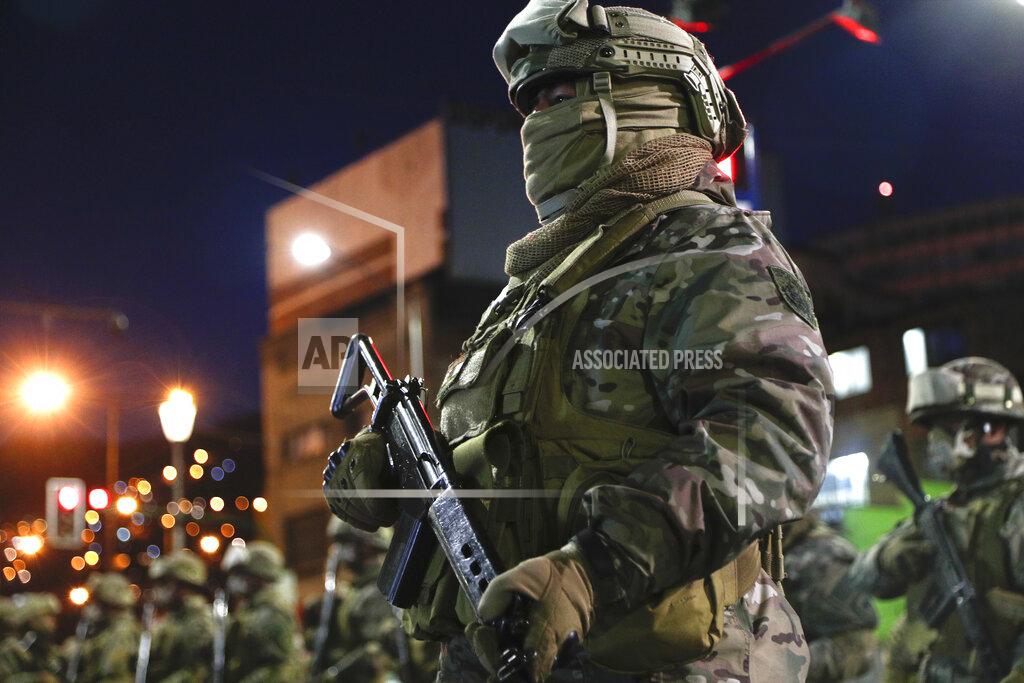 Juan Karita Military police forces guard La Paz, Bolivia, Saturday, Oct. 17, 2020 ahead of Sunday's general election. The upcoming presidential election gives Bolivians a chance for a political reset as they struggle with the dramatic costs of the COVID-19 pandemic. (AP Photo/Juan Karita)