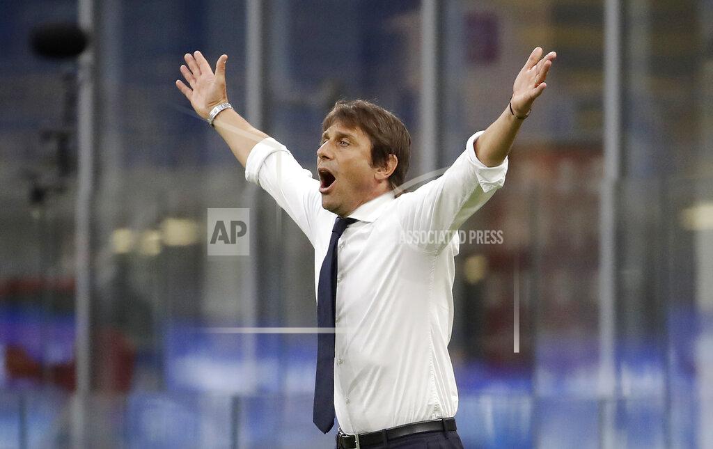 Luca Bruno Inter Milan's head coach Antonio Conte gestures during the Serie A soccer match between Inter Milan and Sassuolo at the San Siro Stadium, in Milan, Italy, Wednesday, June 24, 2020. (AP Photo/Luca Bruno)