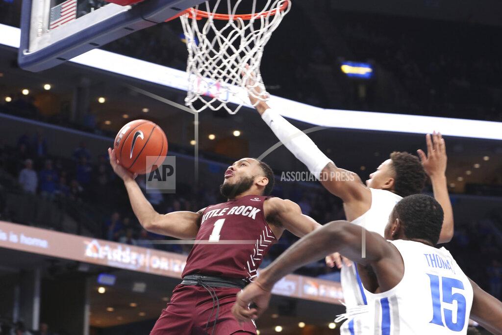 Karen Pulfer Focht Memphis' Boogie Ellis, right rear, guards and Little Rock's Markquis Nowell (1) as he goes up for a basket during the first half of an NCAA college basketball game Wednesday, Nov. 20, 2019, in Memphis, Tenn. (AP Photo/Karen Pulfer Focht)