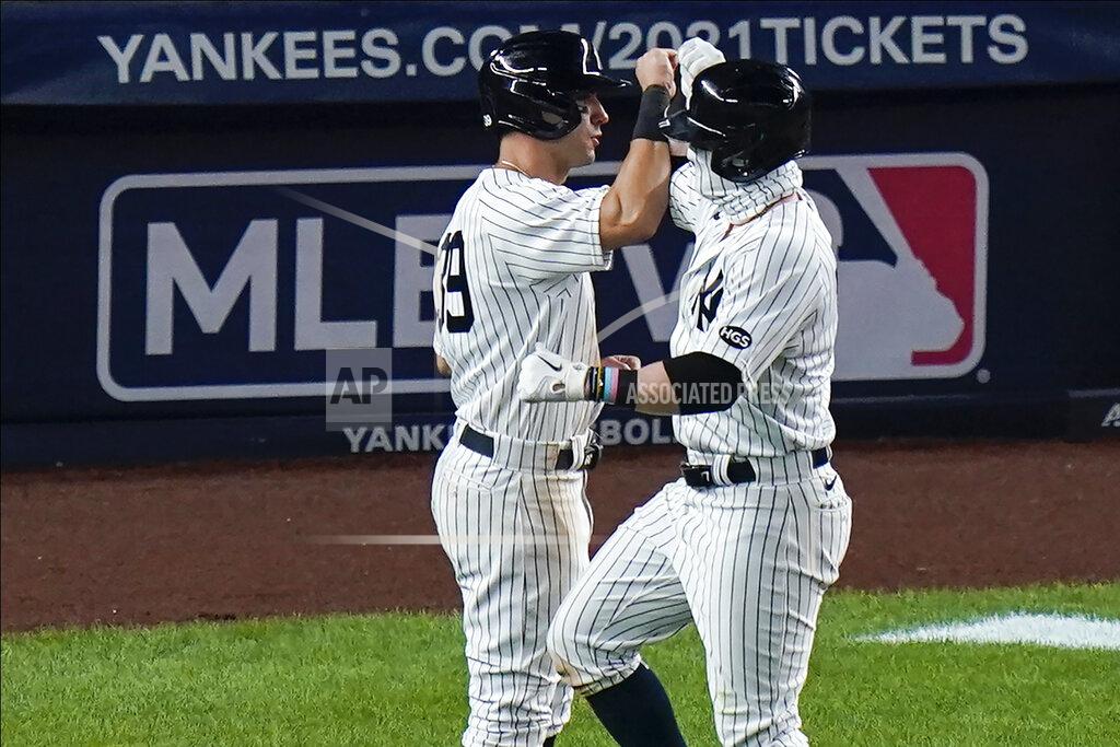 Frank Franklin Ii New York Yankees' Mike Tauchman, left, celebrates with Clint Frazier, right, after Frazier hit a three-run home run during the sixth inning of a baseball game against the Boston Red Sox Saturday, Aug. 15, 2020, in New York. (AP Photo/Frank Franklin II)
