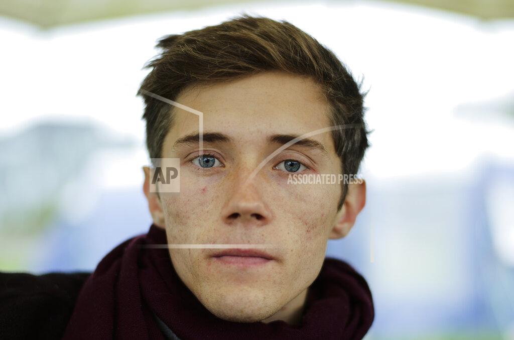 Markus Schreiber Climate activist Henning Jeschke who is since 24 days on a hunger strike lays on a mattress under a tent in a small camp of climate activists as he poses for a photo in Berlin, Wednesday, Sept. 22, 2021. With his hunger strike he hopes to pressure candidates for chancellor of Germany into meeting him for a debate about the climate crisis ahead Sunday's general election. For the first time in Germany's history, climate change is a central issue of an election campaign, overwhelmingly so for the young generation. (AP Photo/Markus Schreiber)