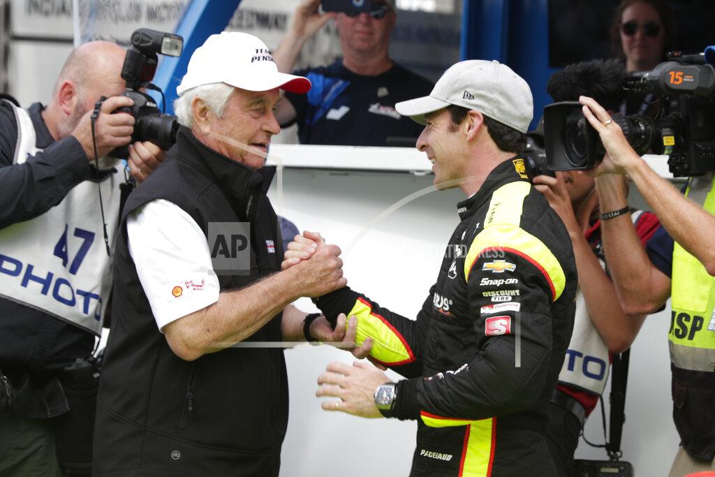 Michael Conroy Simon Pagenaud, of France, is congratulated by car owner Roger Penske after winning the pole during qualifications for the Indianapolis 500 IndyCar auto race at Indianapolis Motor Speedway, Sunday, May 19, 2019 in Indianapolis. (AP Photo/Michael Conroy)