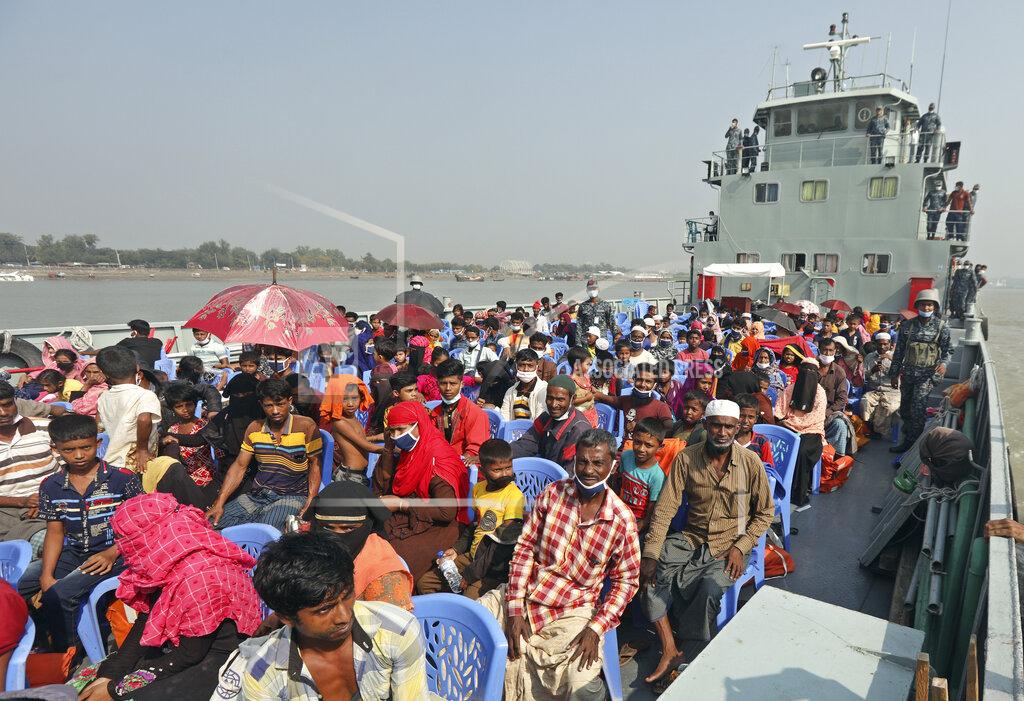 Uncredited Rohingya refugees are transported on a naval vessel to Bhashan Char, or floating island, in the Bay of Bengal, from Chittagong, Bangladesh, Friday, Dec. 4, 2020. Authorities in Bangladesh on Friday started sending a first group of nearly more than 1,500 Rohingya refugees to an isolated island despite calls by human rights groups for a halt to the process. (AP Photo)