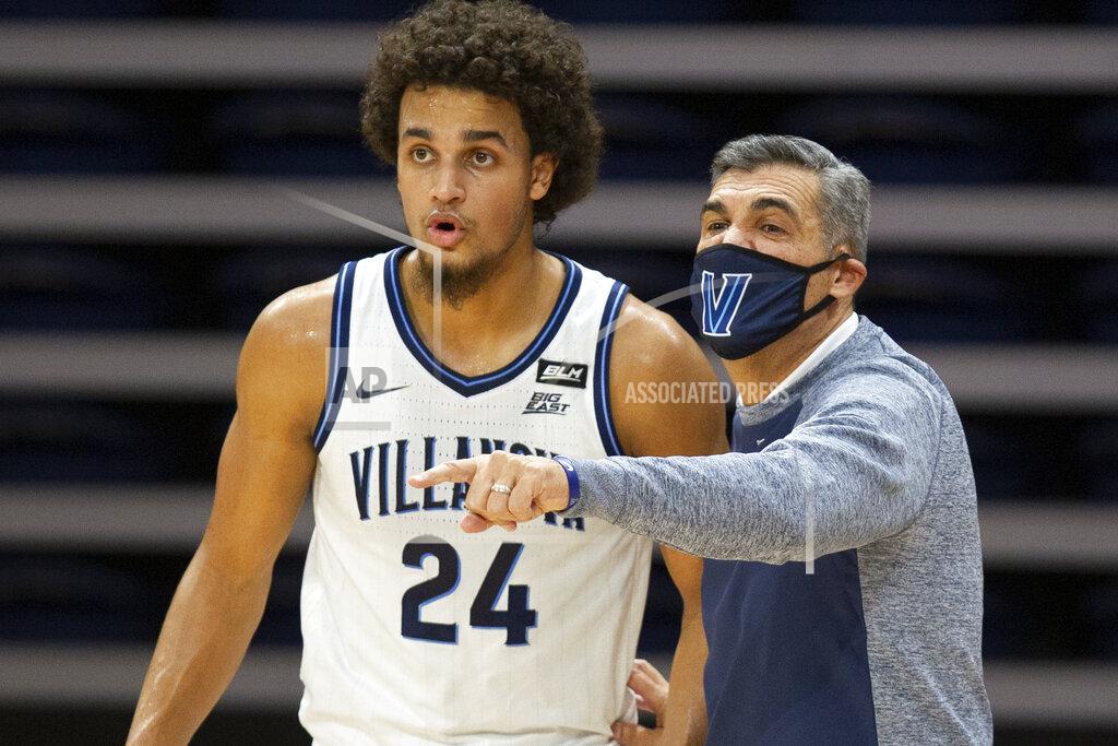 Laurence Kesterson Villanova head coach Jay Wright talks with forward Jeremiah Robinson-Earl (24) during the first half of an NCAA college basketball game against Seton Hall, Tuesday, Jan. 19, 2021, in Villanova, Pa. (AP Photo/Laurence Kesterson)