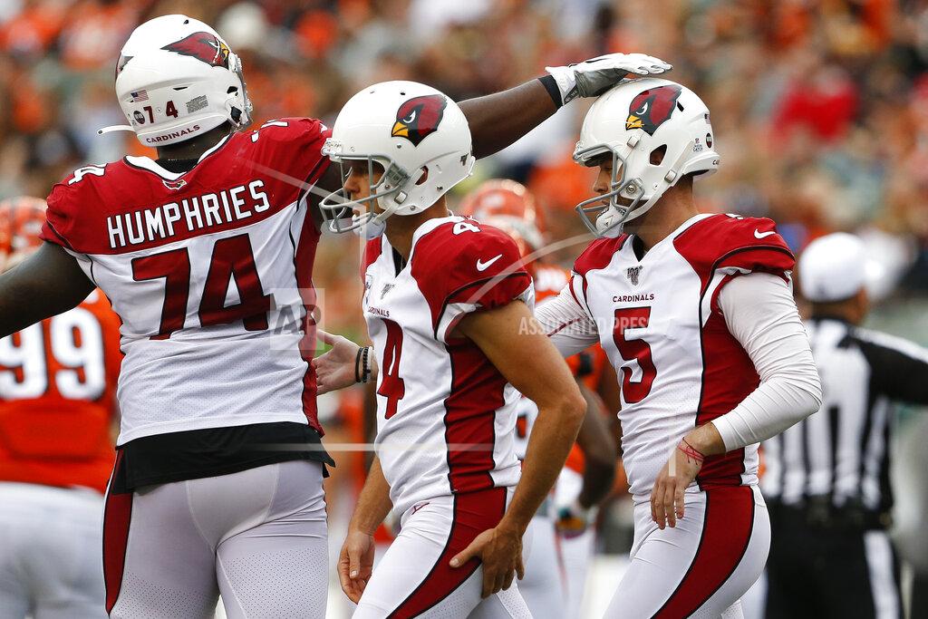 Gary Landers Arizona Cardinals kicker Zane Gonzalez (5) celebrates his field goal kick with offensive tackle D.J. Humphries (74) in the second half of an NFL football game against the Cincinnati Bengals, Sunday, Oct. 6, 2019, in Cincinnati. (AP Photo/Gary Landers)