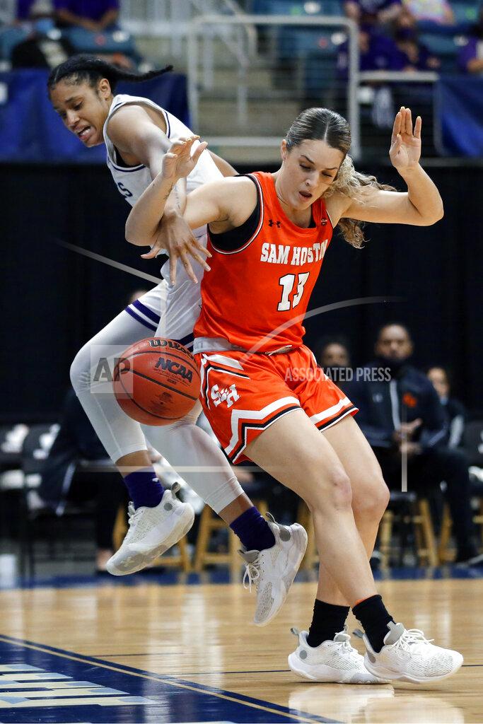 Michael Wyke Stephen F. Austin guard Alyssa Mayfield, left, and Sam Houston State forward Kaylee Jefferson, right, tangle as they chase a loose ball during the first half of an NCAA college basketball game for the Southland Conference women's tournament championship Sunday, March 14, 2021, in Katy, Texas. (AP Photo/Michael Wyke)