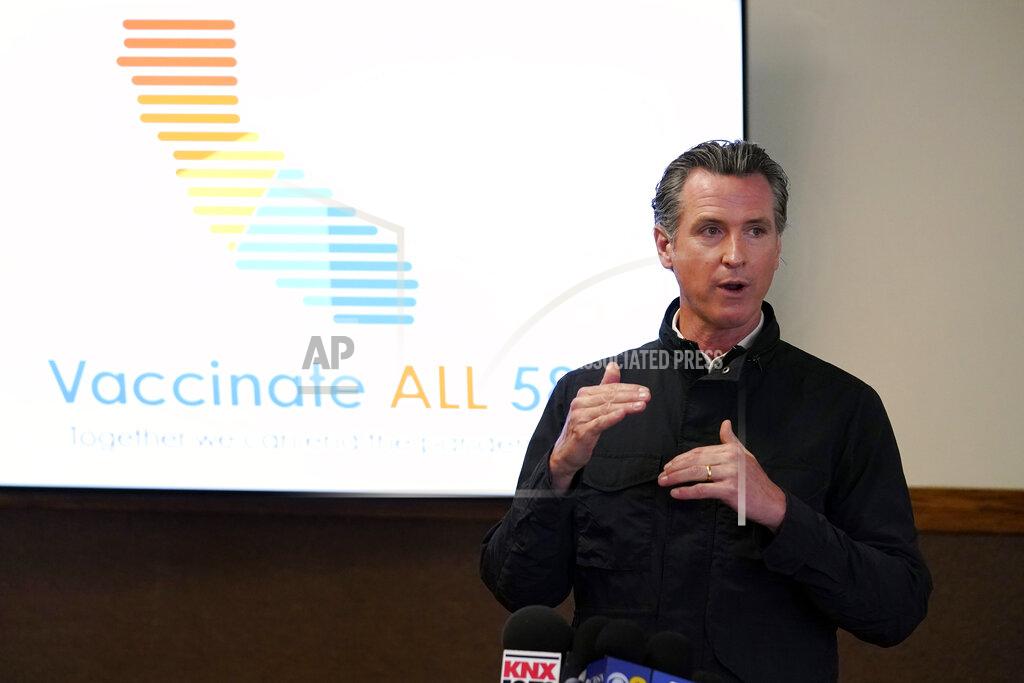 Marcio Jose Sanchez FILE - In this March 10, 2021, file photo, California Gov. Gavin Newsom addresses the media during a visit to a vaccination center in South Gate, Calif. California is expanding its vaccine eligibility to anyone 50 and over starting in April and anyone 16 and over on April 15. Gov. Newsom said Thursday, March 25, 2021, that California expects to receive 2.5 million doses a week in the first half of April and more than 3 million a week in the second half of the month. (AP Photo/Marcio Jose Sanchez, File)