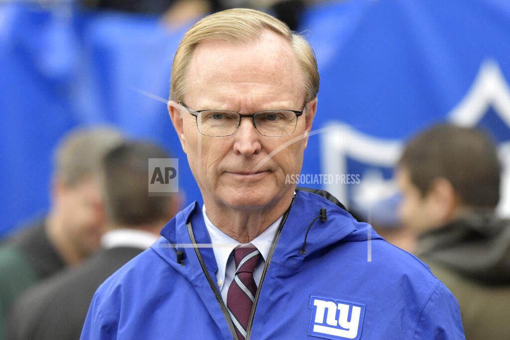 Bill Kostroun FILE - New York Giants owner John Mara walks on the field prior to an NFL football game against the Chicago Bears, Sunday, Dec. 2, 2018, in East Rutherford, N.J. A long-time advocate of the right to protest for social change and equality, New York Giants co-owner John Mara admits he was stunned listening to his players talk about their experiences with police and authorities in the wake of the death George Floyd in June.(AP Photo/Bill Kostroun, File)