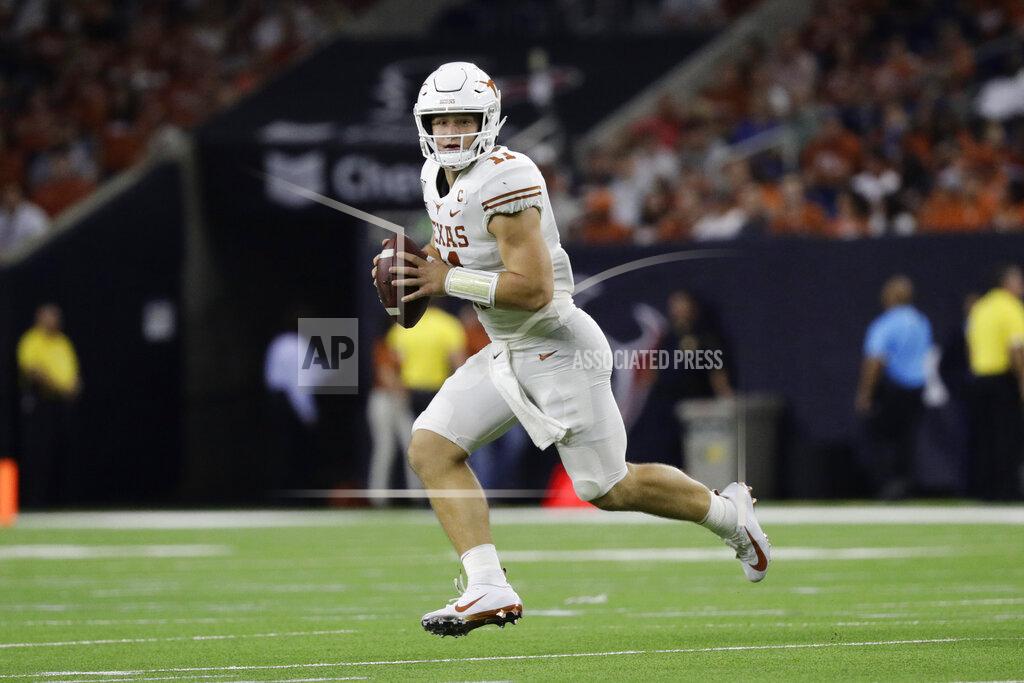 Eric Gay FILE - In this Sept. 14, 2019, file photo, Texas quarterback Sam Ehlinger (11) looks to throw against Rice during the second half of an NCAA college football game in Houston. While Oklahoma appears to have another serious Heisman contender with Big 12 newcomer and dual-threat graduate transfer Jalen Hurts, the Longhorns have one of the eight underclassmen starting quarterbacks in the league. Texas junior Sam Ehlinger is off to a record-setting pace that could also get him in that Heisman conversation. (AP Photo/Eric Gay, File)