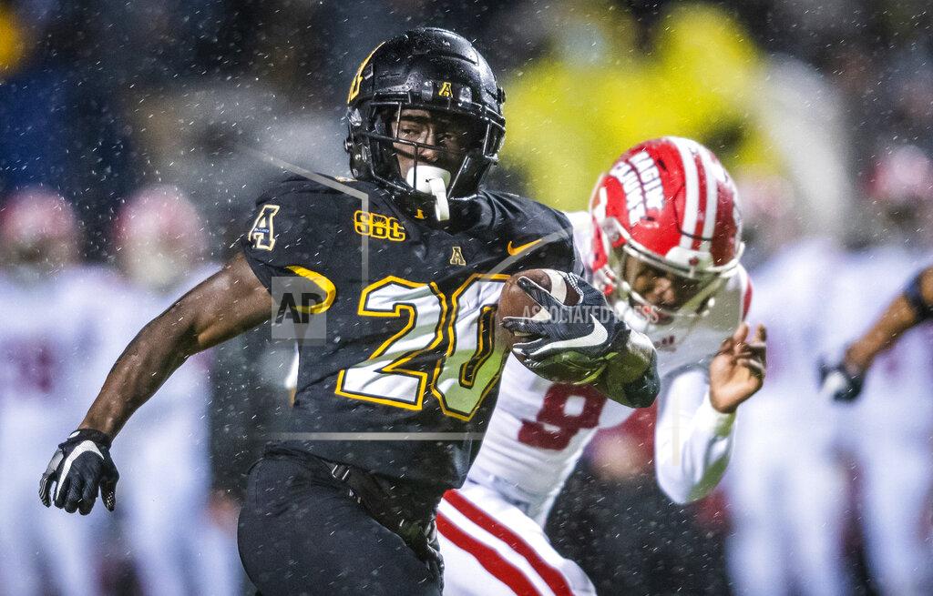 Andrew Dye Appalachian State running back Nate Noel (20) runs the ball on his way to a touchdown against Louisiana during an NCAA college football game Friday, Dec. 4, 2020, in Boone, N.C. (Andrew Dye/The Winston-Salem Journal via AP)